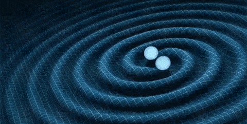 Two blue spheres circle each other on a grid representing space-time. As the spheres orbit, ripples propagate outward along the grid, representing gravitational waves.